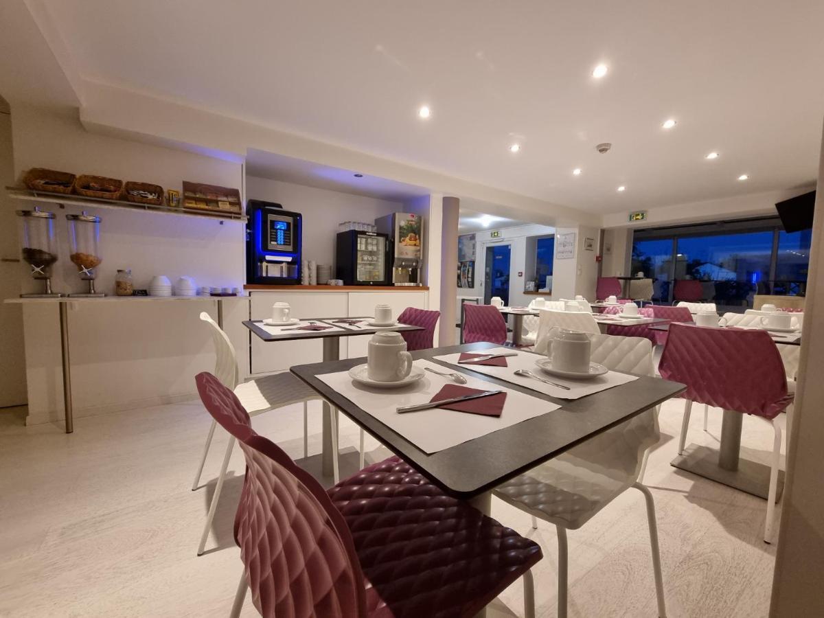 Cit'Hotel Les Atlantes Medis Bagian luar foto