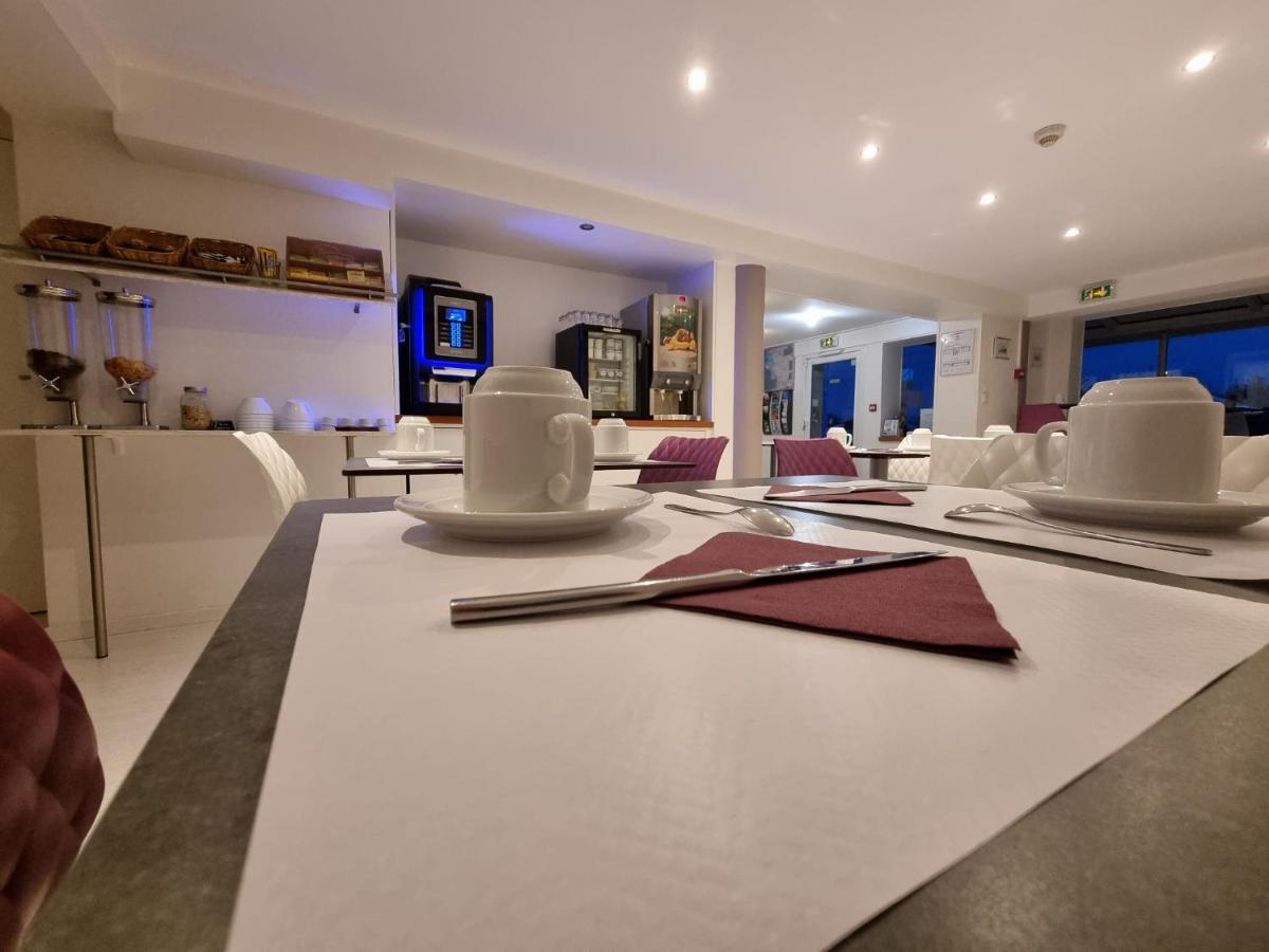 Cit'Hotel Les Atlantes Medis Bagian luar foto